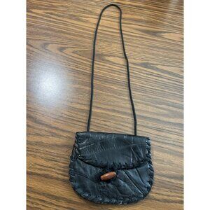 Black quilted leather crossbody bag with wood pin closure